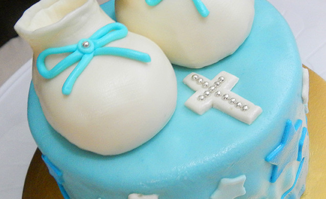 Baby bootsies baptismal cake
